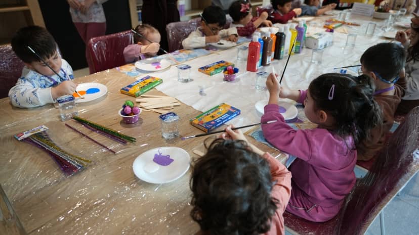 A Bookmark Workshop for IHU Children Was Held During the 62nd Library Week